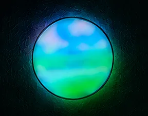 Round wall light washing the wall in blue and green